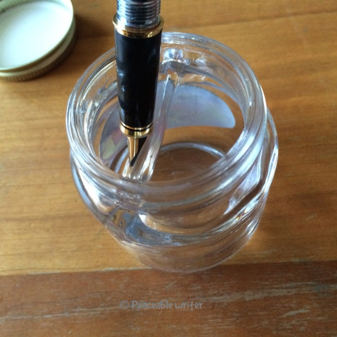 Empty Sheaffer bottle with divided inkwell